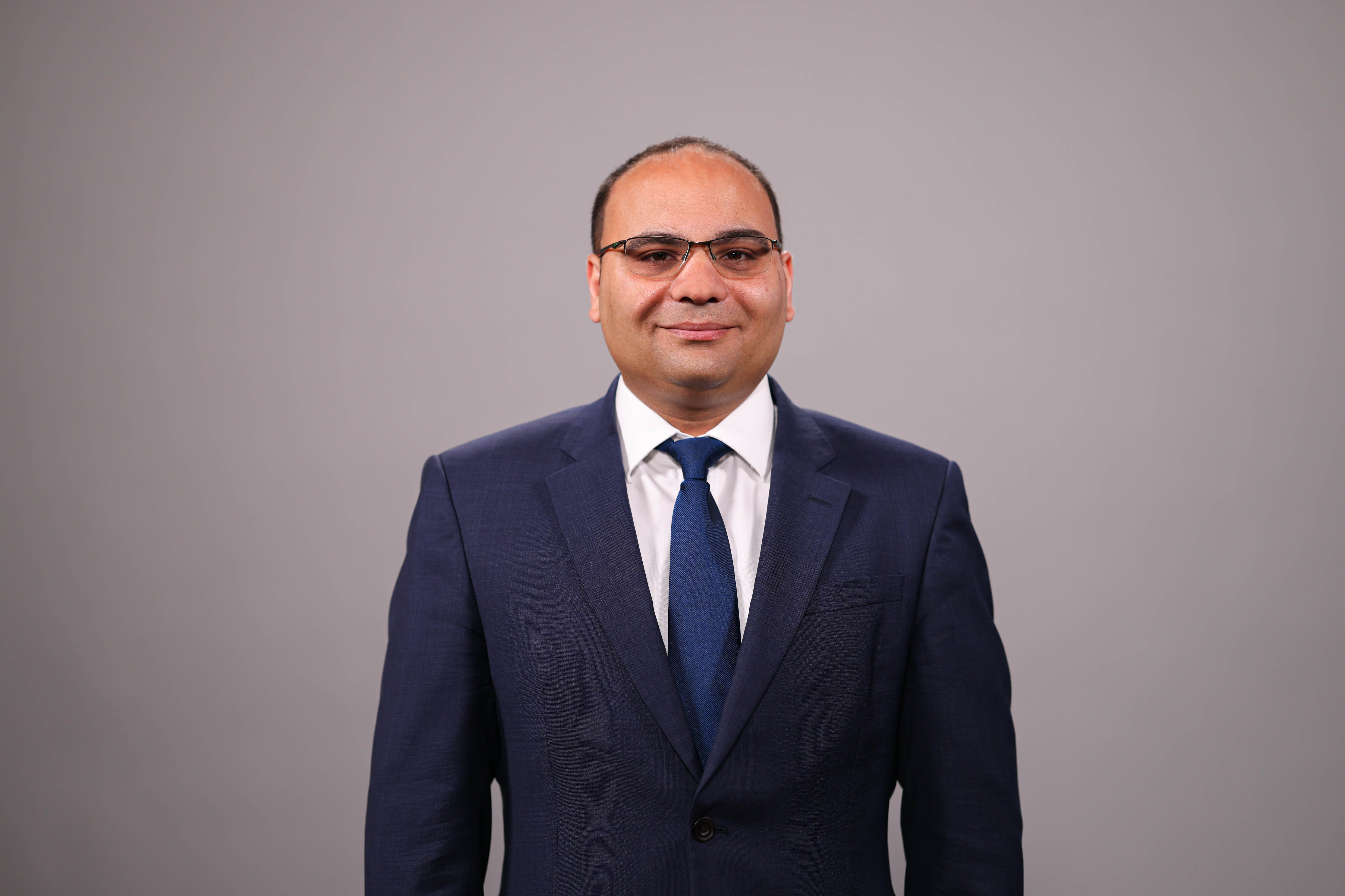 Official portrait of Minister for Finance Clyde Caruana.
